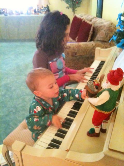 LorenzoAndGabriellaPlayingThePiano
