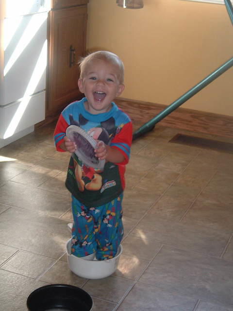 Look Mom, I can stand in you pot.