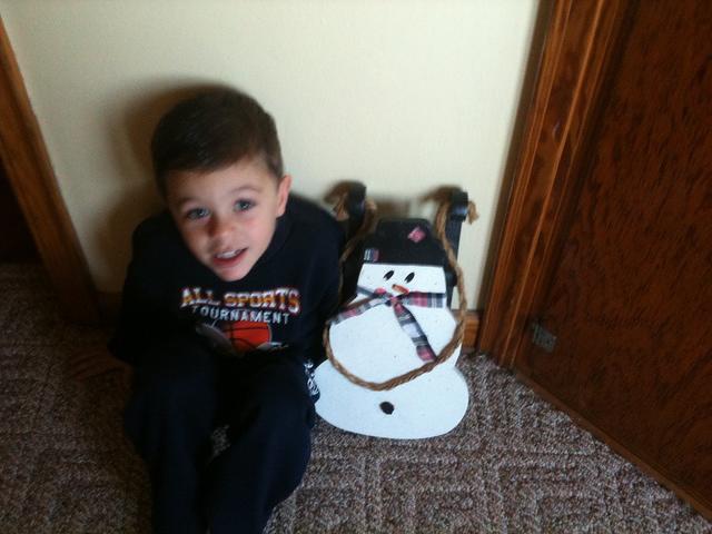 TheLittleGuy_PosingWithFrostySleigh_2011.JPG