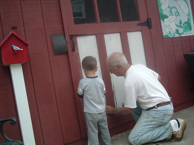 Boo Boo Helping Papa Sand the Shed Door 10-17-2011