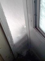 BackDoorUnderPorchMorningAfterStorm02062010.jpg