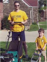 DaddyAndBooBooMowingTheFrontLawn_05112011_compressed