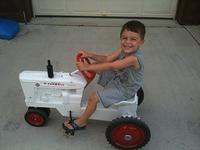 TheLittleGuyDrivingHisFarmallMDemonstrator_05072012