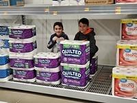 My boys hiding in the big box store.